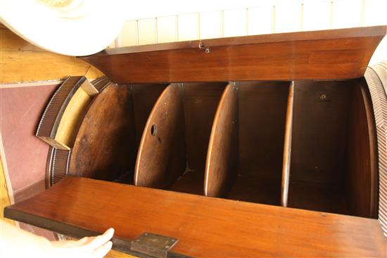 A George III mahogany and rosewood crossbanded reeded hanging corner cupboard, H.3ft 9in.